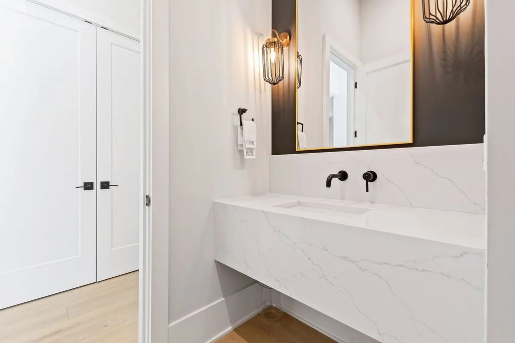The Estate in Raleigh is a luxurious home featuring open-concept with natural light and expansive windows throughout now available for sale. This home located at 7145 N Ridge Dr, Raleigh, North Carolina; offering 04 bedrooms and 05 bathrooms with 5,702 square feet of living spaces. 