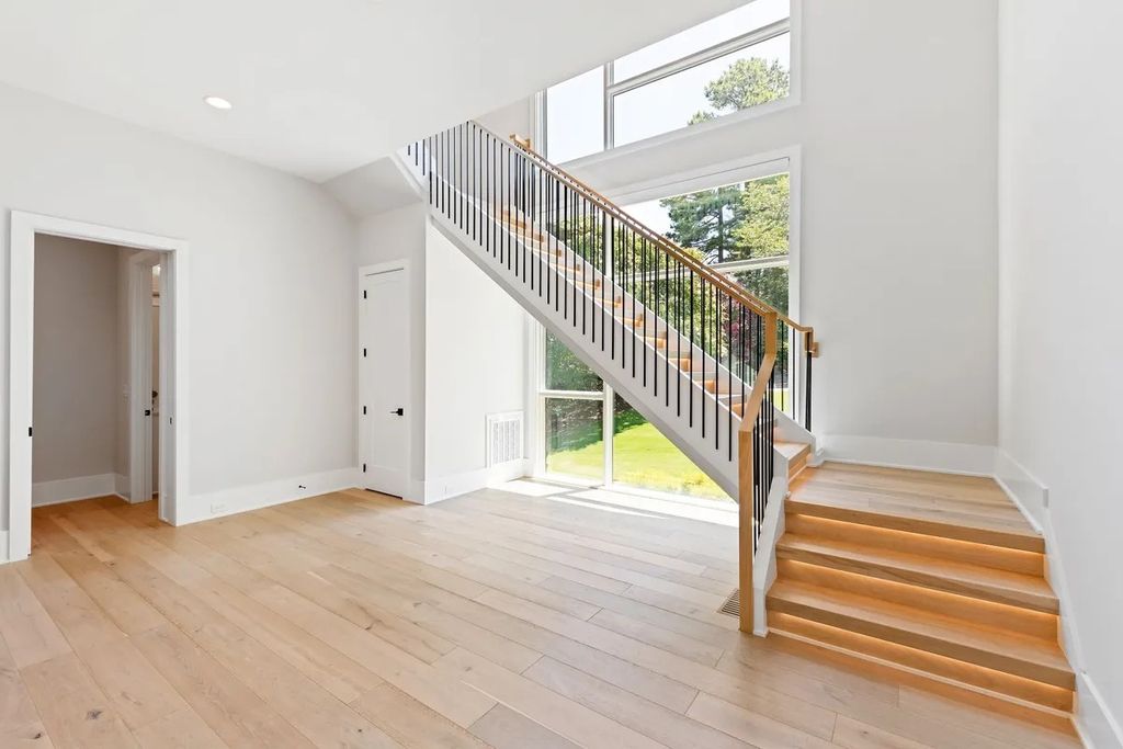 The Estate in Raleigh is a luxurious home featuring open-concept with natural light and expansive windows throughout now available for sale. This home located at 7145 N Ridge Dr, Raleigh, North Carolina; offering 04 bedrooms and 05 bathrooms with 5,702 square feet of living spaces. 