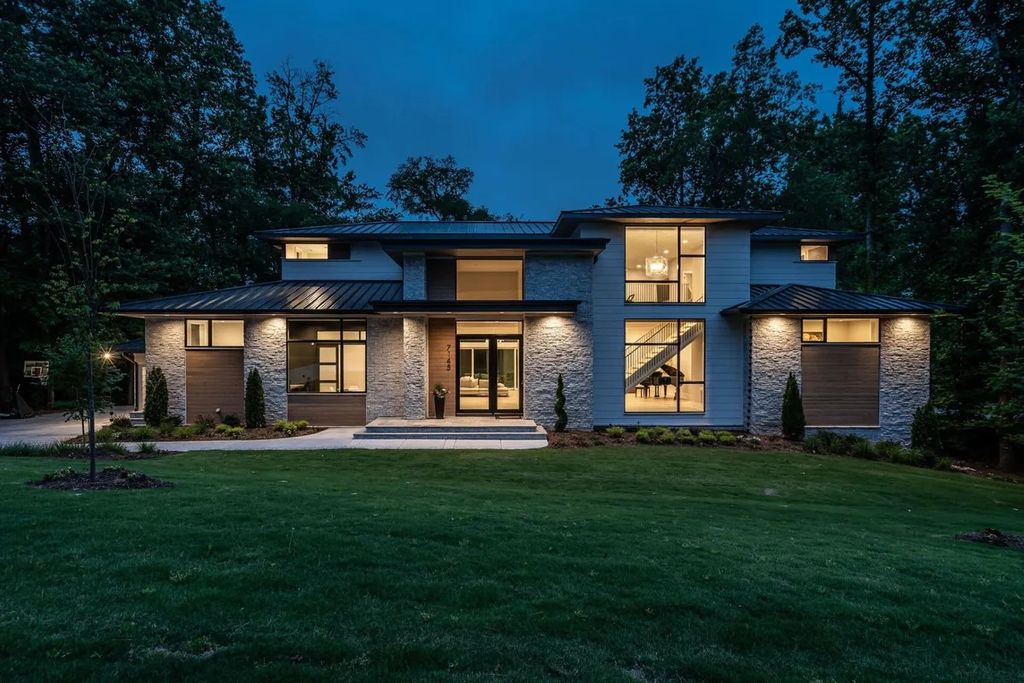 The Estate in Raleigh is a luxurious home featuring open-concept with natural light and expansive windows throughout now available for sale. This home located at 7145 N Ridge Dr, Raleigh, North Carolina; offering 04 bedrooms and 05 bathrooms with 5,702 square feet of living spaces. 