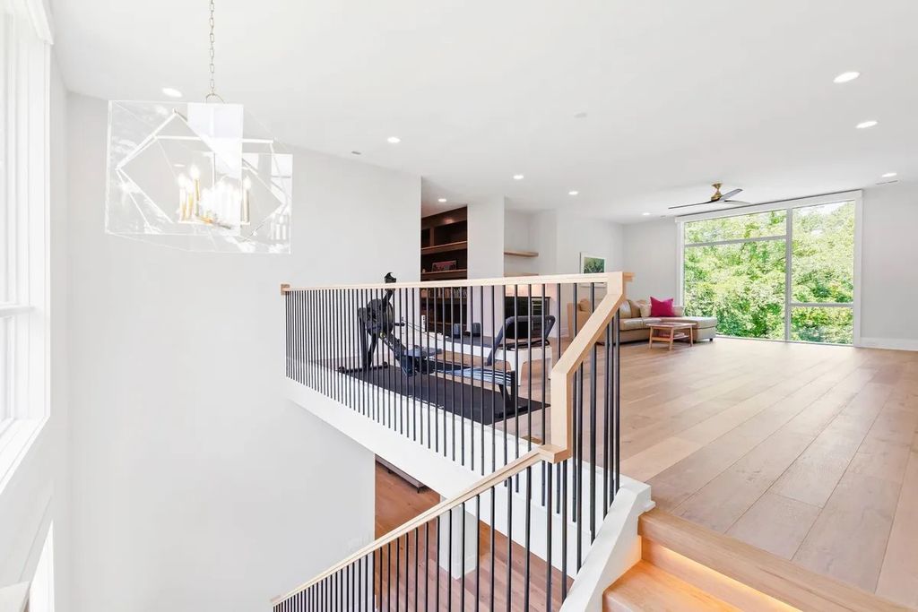 The Estate in Raleigh is a luxurious home featuring open-concept with natural light and expansive windows throughout now available for sale. This home located at 7145 N Ridge Dr, Raleigh, North Carolina; offering 04 bedrooms and 05 bathrooms with 5,702 square feet of living spaces. 