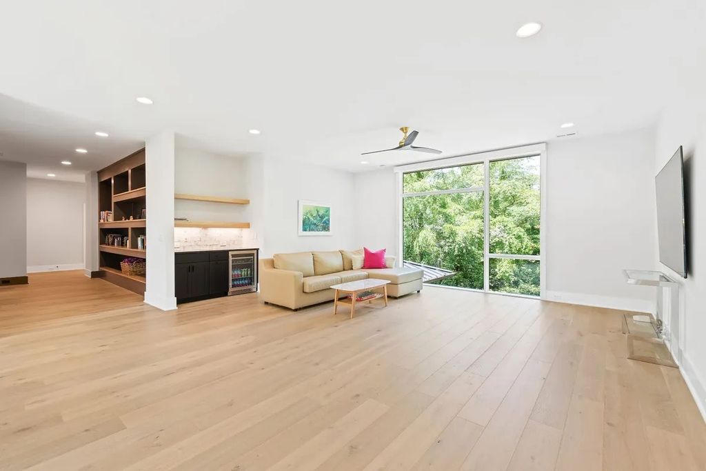 The Estate in Raleigh is a luxurious home featuring open-concept with natural light and expansive windows throughout now available for sale. This home located at 7145 N Ridge Dr, Raleigh, North Carolina; offering 04 bedrooms and 05 bathrooms with 5,702 square feet of living spaces. 