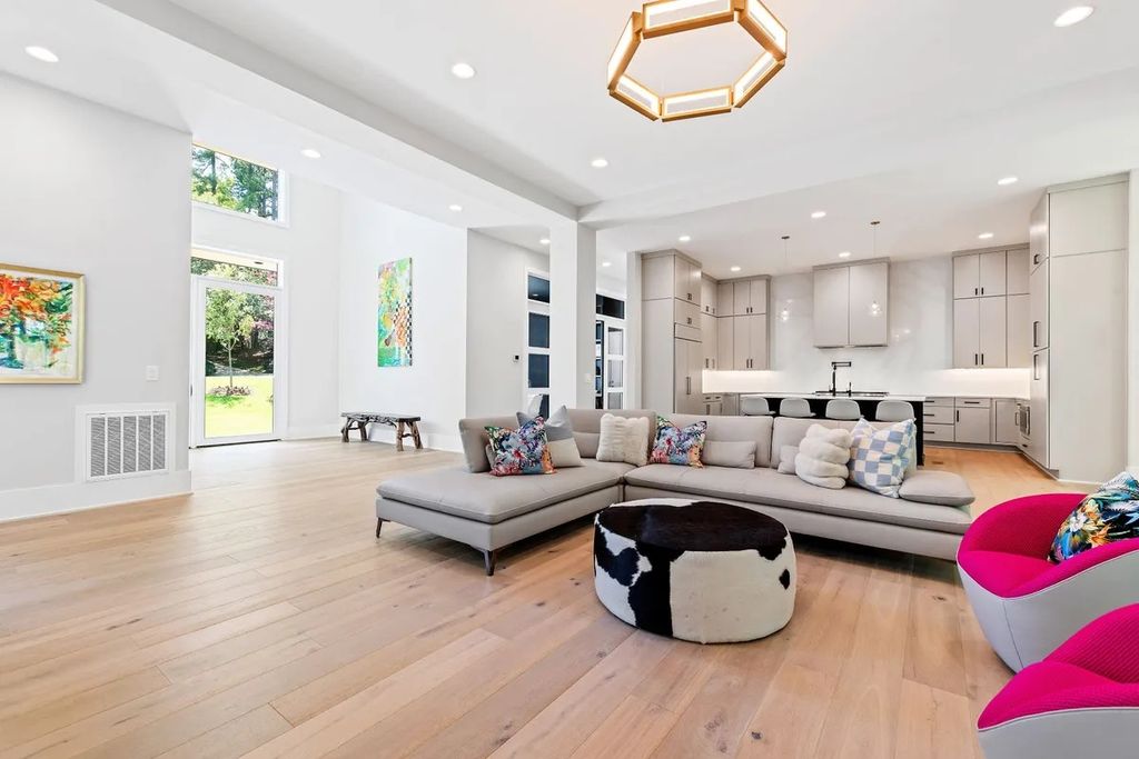 The Estate in Raleigh is a luxurious home featuring open-concept with natural light and expansive windows throughout now available for sale. This home located at 7145 N Ridge Dr, Raleigh, North Carolina; offering 04 bedrooms and 05 bathrooms with 5,702 square feet of living spaces. 