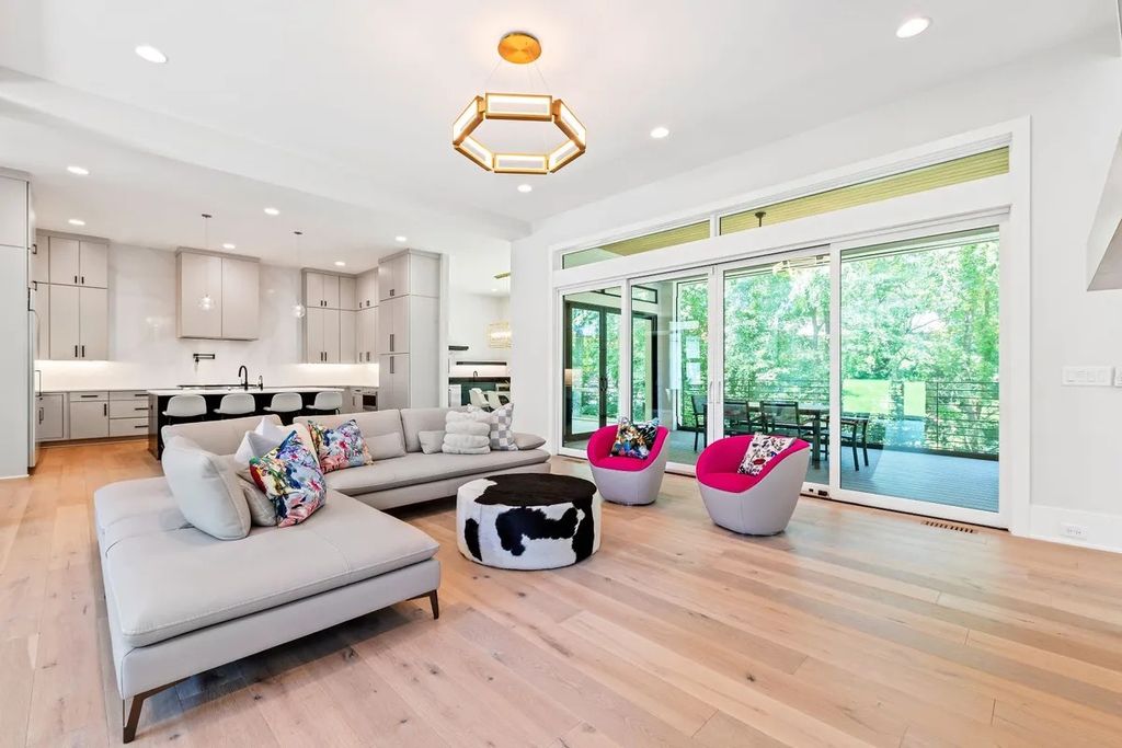 The Estate in Raleigh is a luxurious home featuring open-concept with natural light and expansive windows throughout now available for sale. This home located at 7145 N Ridge Dr, Raleigh, North Carolina; offering 04 bedrooms and 05 bathrooms with 5,702 square feet of living spaces. 