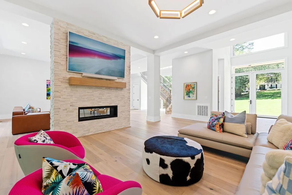 The Estate in Raleigh is a luxurious home featuring open-concept with natural light and expansive windows throughout now available for sale. This home located at 7145 N Ridge Dr, Raleigh, North Carolina; offering 04 bedrooms and 05 bathrooms with 5,702 square feet of living spaces. 