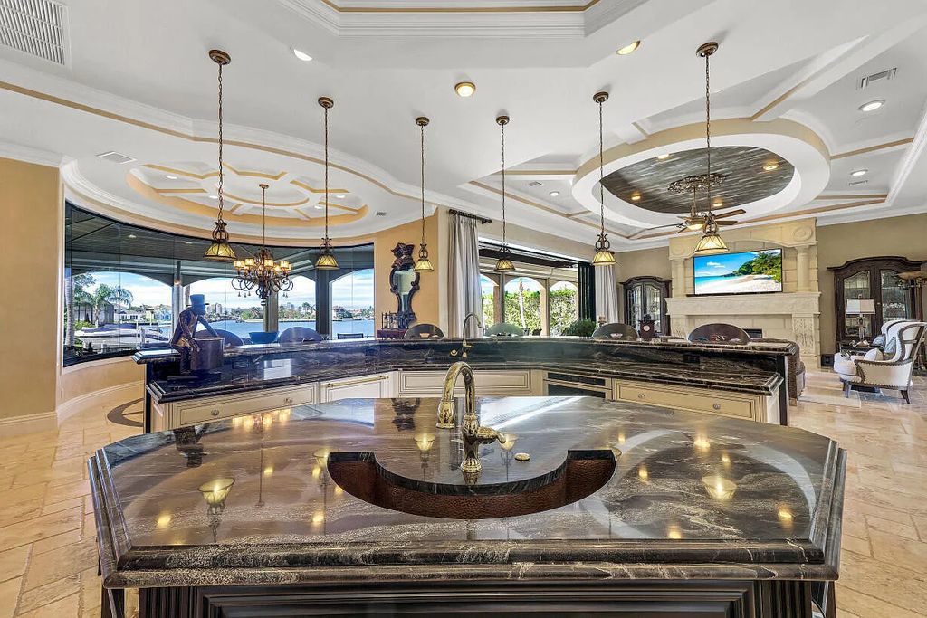590 S Heathwood Drive, Marco Island, Florida is an elegant and refined estate in an ideal location close to Marco Beach, Winterberry and Mackle Park's, restaurants, and shopping.