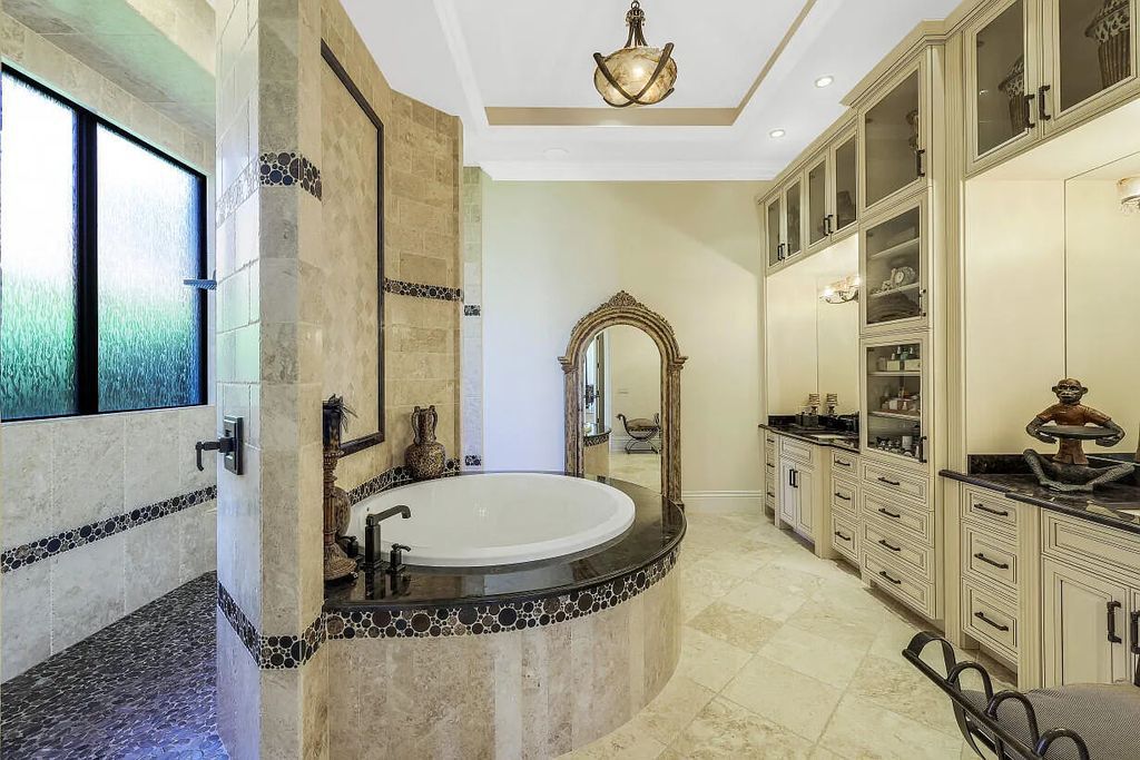 590 S Heathwood Drive, Marco Island, Florida is an elegant and refined estate in an ideal location close to Marco Beach, Winterberry and Mackle Park's, restaurants, and shopping.