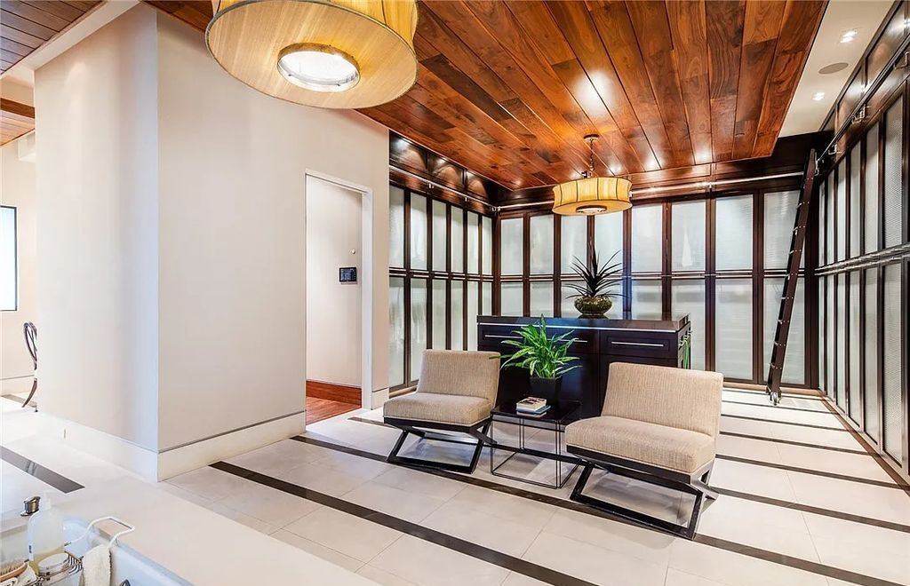 5 Promontory Ridge Drive, Las Vegas, Nevada is a desert contemporary masterpiece set on a cul-de-sac Ridge lot with unobstructed strip, city, mountain and golf course views comes with unparalleled quality of construction. 