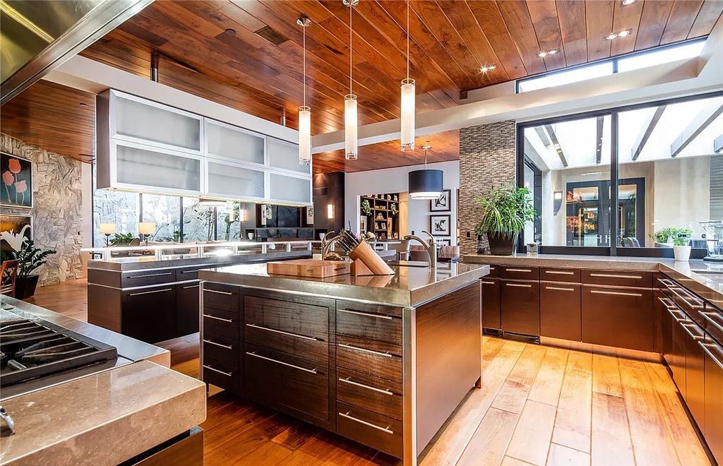 5 Promontory Ridge Drive, Las Vegas, Nevada is a desert contemporary masterpiece set on a cul-de-sac Ridge lot with unobstructed strip, city, mountain and golf course views comes with unparalleled quality of construction. 