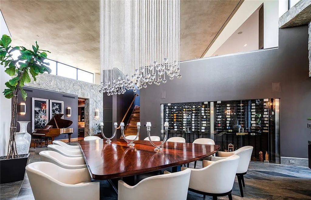 5 Promontory Ridge Drive, Las Vegas, Nevada is a desert contemporary masterpiece set on a cul-de-sac Ridge lot with unobstructed strip, city, mountain and golf course views comes with unparalleled quality of construction. 