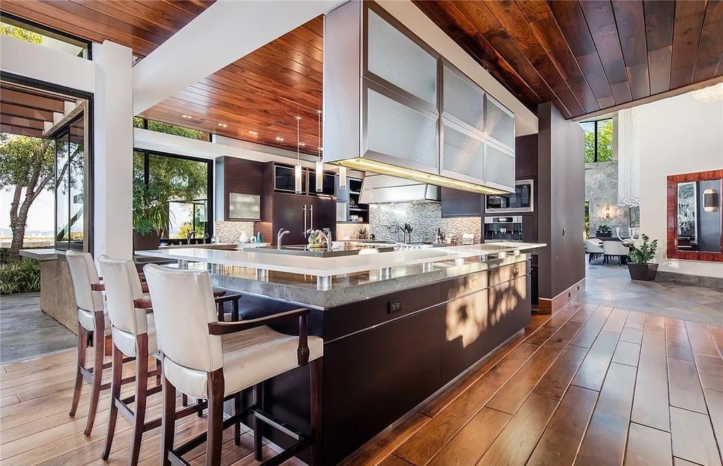 5 Promontory Ridge Drive, Las Vegas, Nevada is a desert contemporary masterpiece set on a cul-de-sac Ridge lot with unobstructed strip, city, mountain and golf course views comes with unparalleled quality of construction. 