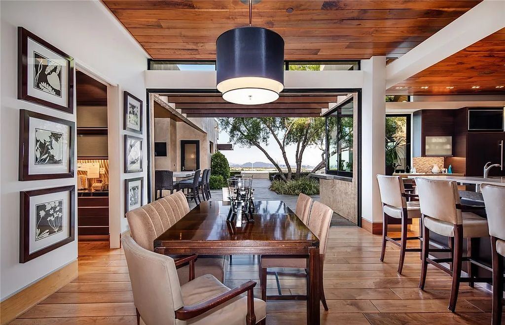 5 Promontory Ridge Drive, Las Vegas, Nevada is a desert contemporary masterpiece set on a cul-de-sac Ridge lot with unobstructed strip, city, mountain and golf course views comes with unparalleled quality of construction. 