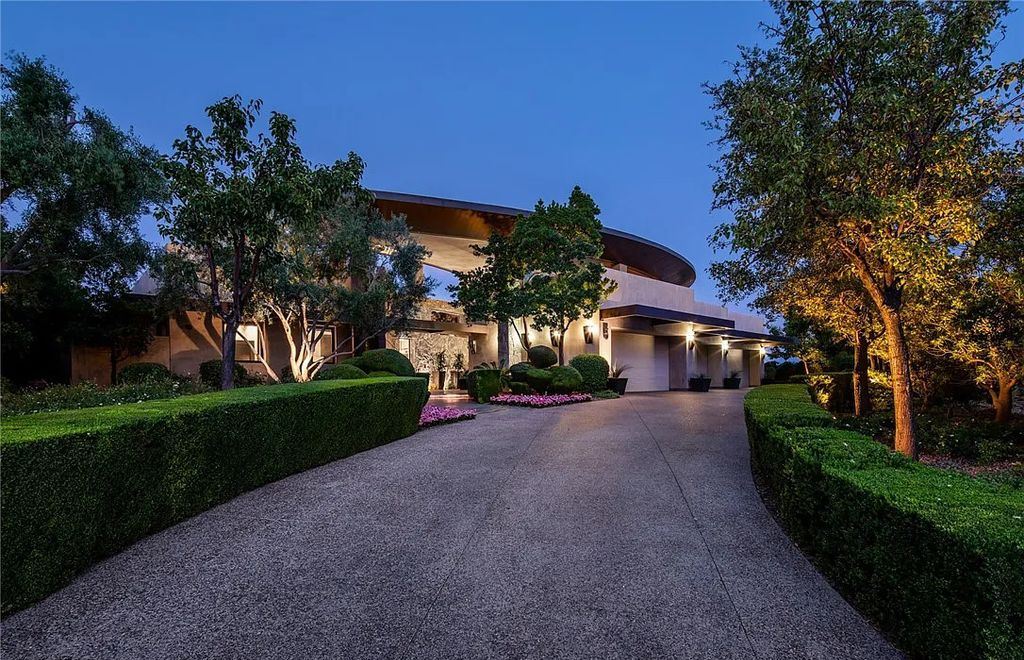5 Promontory Ridge Drive, Las Vegas, Nevada is a desert contemporary masterpiece set on a cul-de-sac Ridge lot with unobstructed strip, city, mountain and golf course views comes with unparalleled quality of construction. 