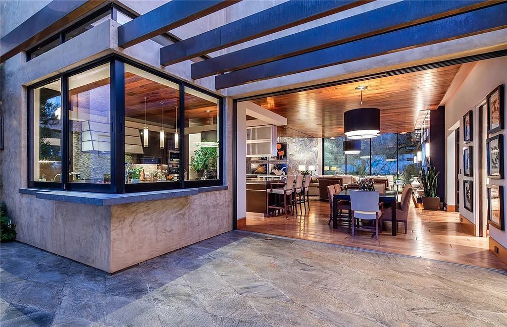 5 Promontory Ridge Drive, Las Vegas, Nevada is a desert contemporary masterpiece set on a cul-de-sac Ridge lot with unobstructed strip, city, mountain and golf course views comes with unparalleled quality of construction. 