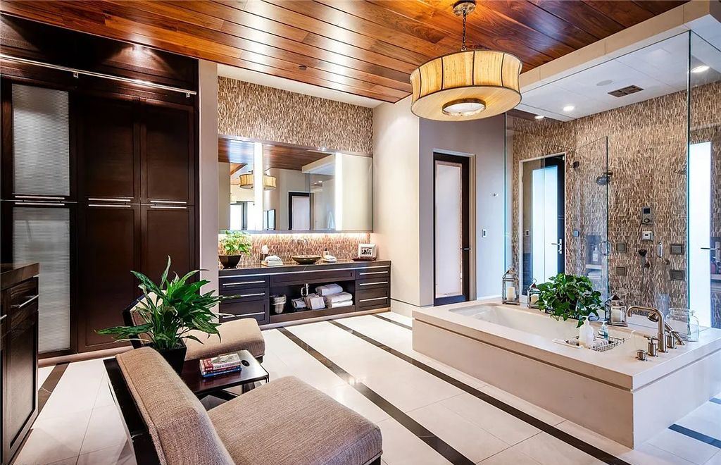 5 Promontory Ridge Drive, Las Vegas, Nevada is a desert contemporary masterpiece set on a cul-de-sac Ridge lot with unobstructed strip, city, mountain and golf course views comes with unparalleled quality of construction. 