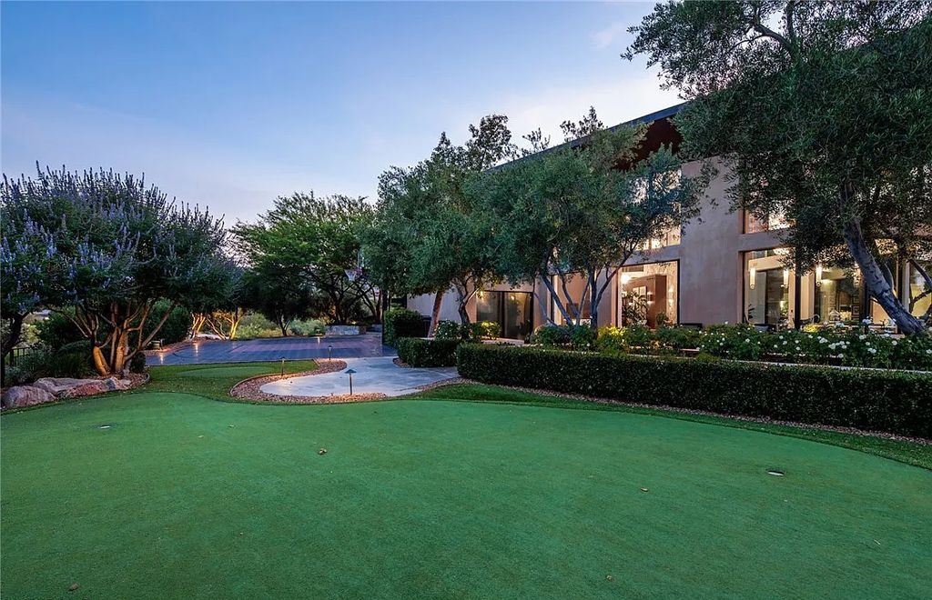 5 Promontory Ridge Drive, Las Vegas, Nevada is a desert contemporary masterpiece set on a cul-de-sac Ridge lot with unobstructed strip, city, mountain and golf course views comes with unparalleled quality of construction. 