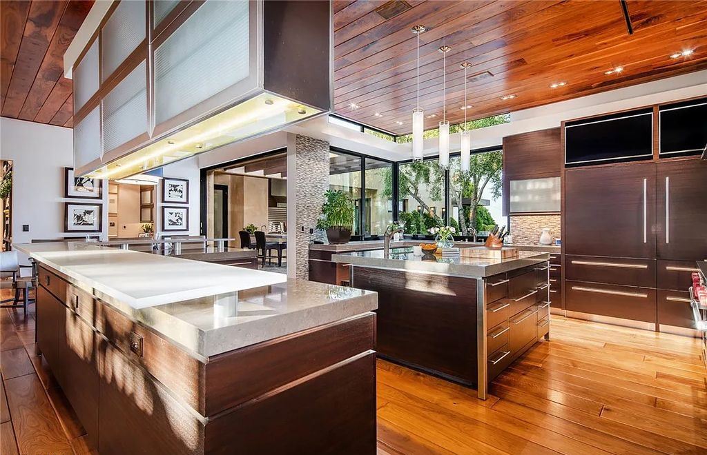 5 Promontory Ridge Drive, Las Vegas, Nevada is a desert contemporary masterpiece set on a cul-de-sac Ridge lot with unobstructed strip, city, mountain and golf course views comes with unparalleled quality of construction. 