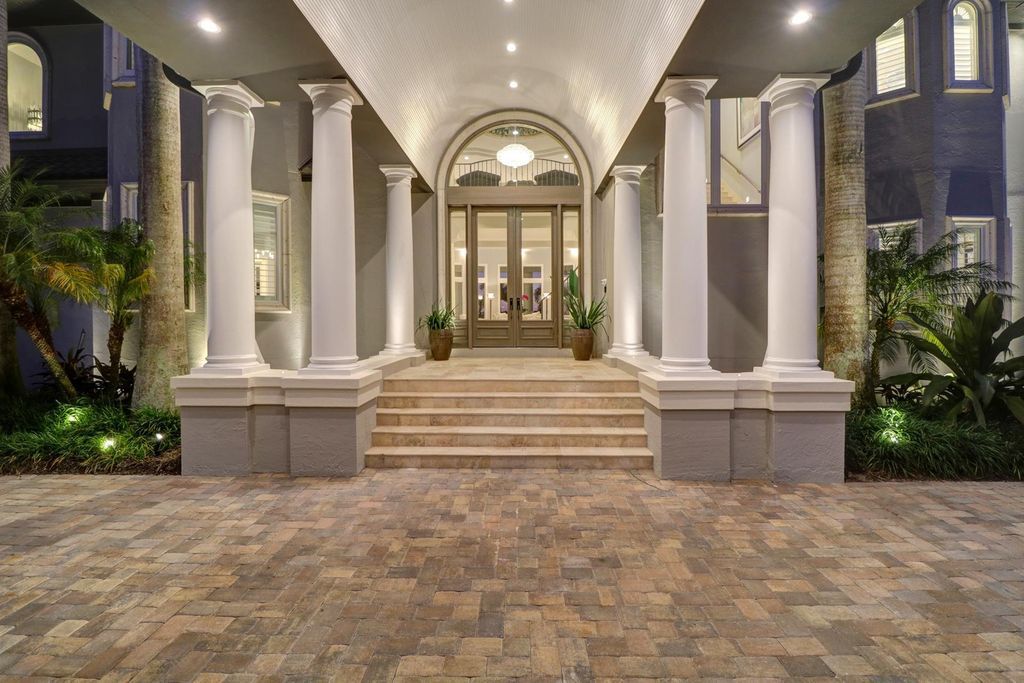 2131 Oceanview Drive, Tierra Verde, Florida is a resort-class estate with 276 feet of beautiful water on the Gulf of Mexico in the Westhore neighborhood, sits on manicured gated and recently fenced grounds with mature palms and landscaping.
