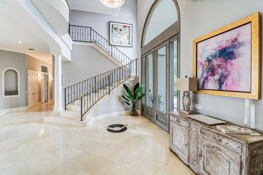 2131 Oceanview Drive, Tierra Verde, Florida is a resort-class estate with 276 feet of beautiful water on the Gulf of Mexico in the Westhore neighborhood, sits on manicured gated and recently fenced grounds with mature palms and landscaping.