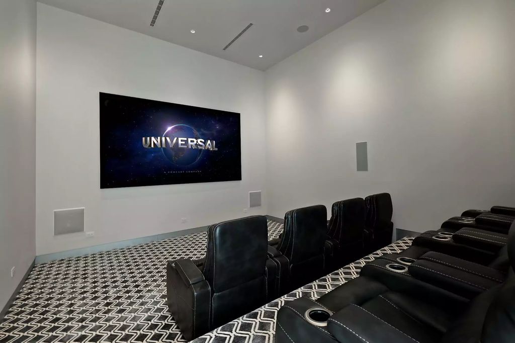 10861 Stardust Drive, Las Vegas, Nevada is spectacular property located in Discovery Land Company’s coveted and exclusive Summit Club offering the ultimate in privacy sitting on its own 1.37-acre peninsula lot.