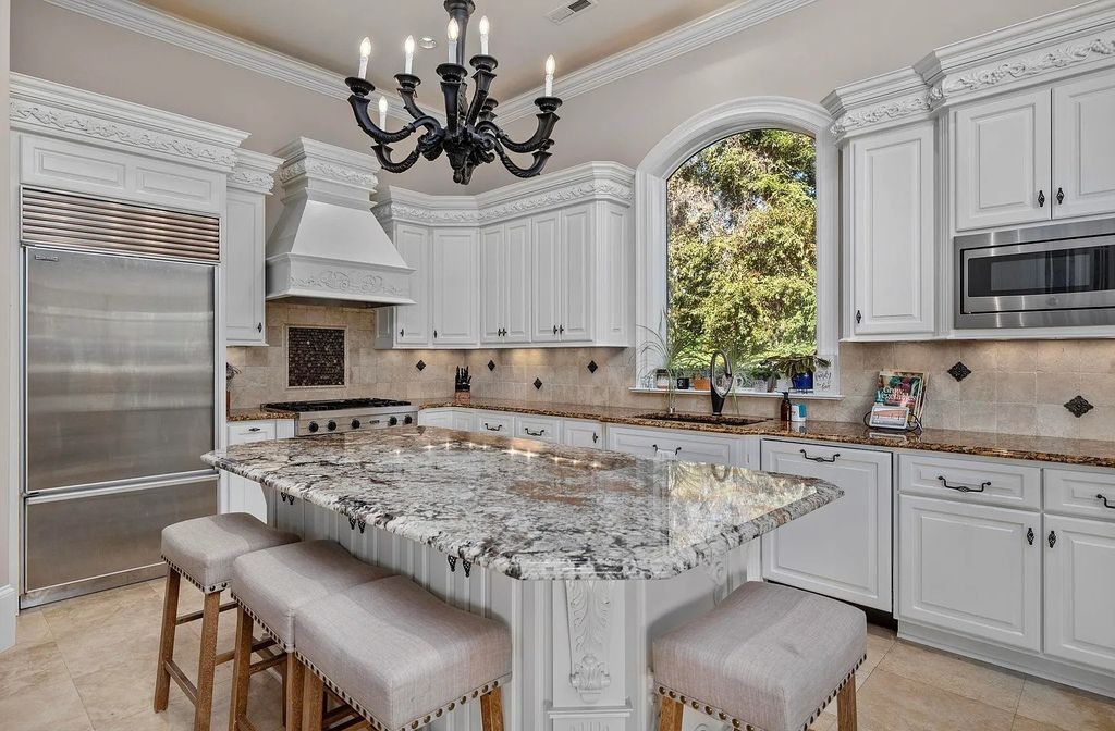 The House in Myrtle Beach is situated on 0.57 acres of land, which includes more than 200 feet of golf course and lakefront views, now available for sale. This home located at 1495 Scala Ct, Myrtle Beach, South Carolina