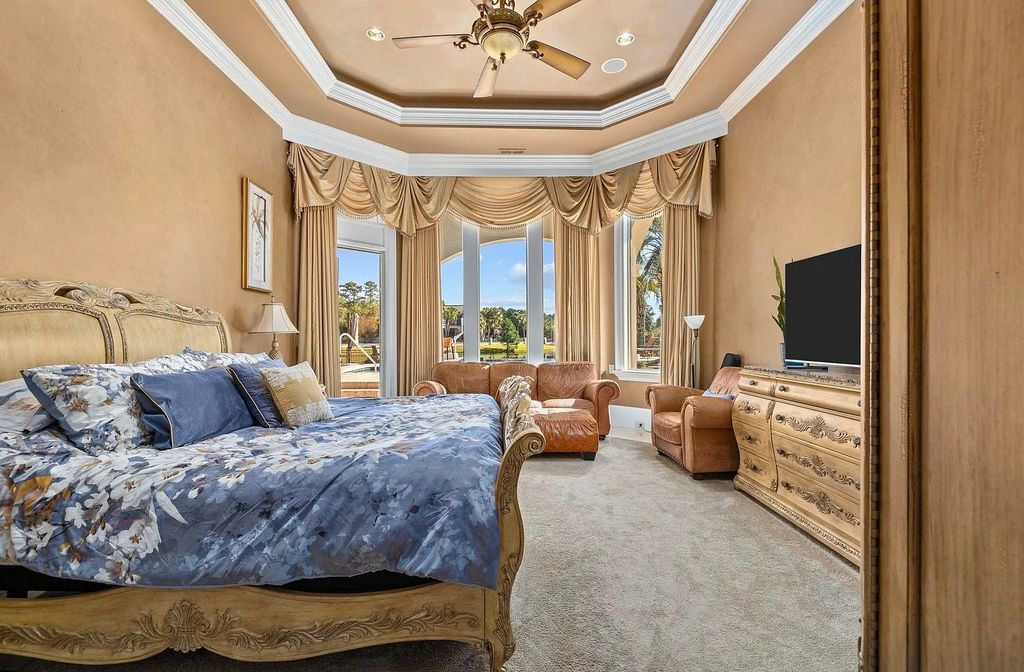 The House in Myrtle Beach is situated on 0.57 acres of land, which includes more than 200 feet of golf course and lakefront views, now available for sale. This home located at 1495 Scala Ct, Myrtle Beach, South Carolina