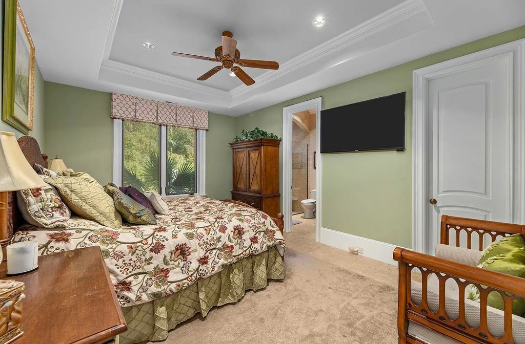 The House in Myrtle Beach is situated on 0.57 acres of land, which includes more than 200 feet of golf course and lakefront views, now available for sale. This home located at 1495 Scala Ct, Myrtle Beach, South Carolina