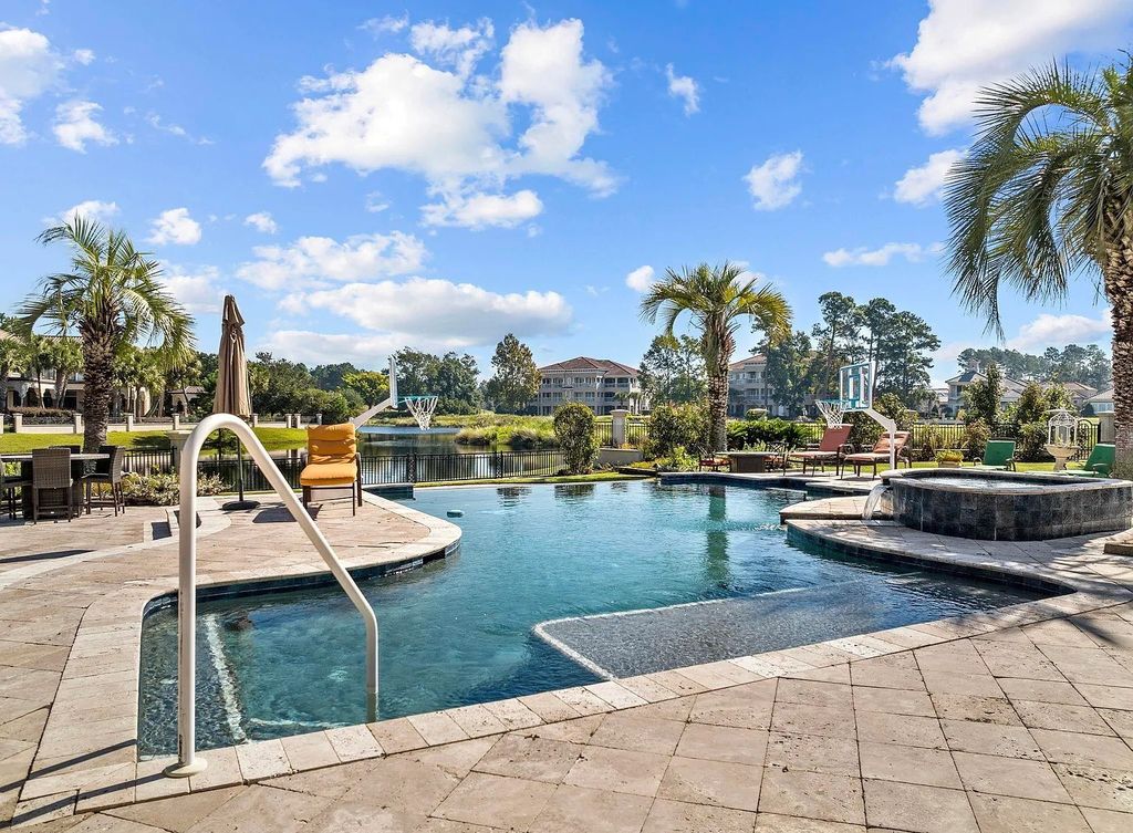The House in Myrtle Beach is situated on 0.57 acres of land, which includes more than 200 feet of golf course and lakefront views, now available for sale. This home located at 1495 Scala Ct, Myrtle Beach, South Carolina