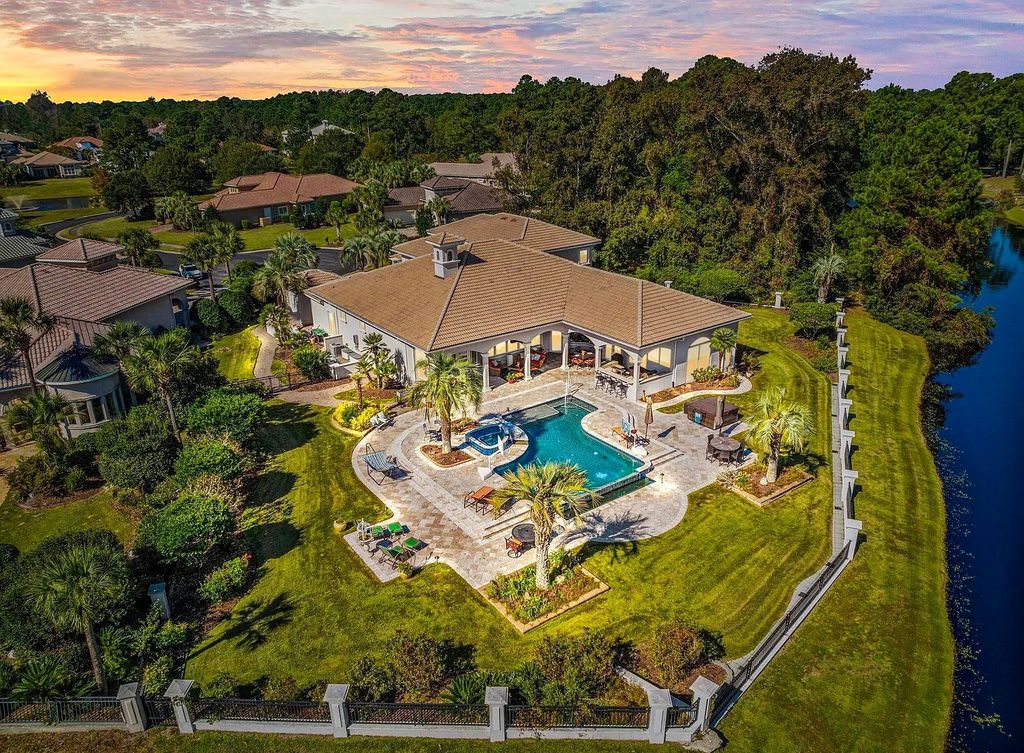 The House in Myrtle Beach is situated on 0.57 acres of land, which includes more than 200 feet of golf course and lakefront views, now available for sale. This home located at 1495 Scala Ct, Myrtle Beach, South Carolina