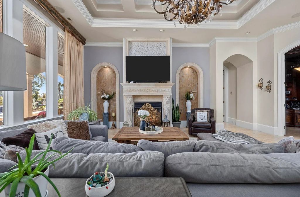 The House in Myrtle Beach is situated on 0.57 acres of land, which includes more than 200 feet of golf course and lakefront views, now available for sale. This home located at 1495 Scala Ct, Myrtle Beach, South Carolina