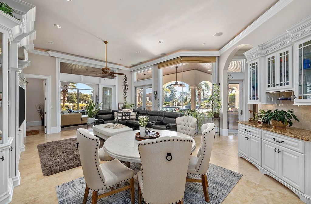 The House in Myrtle Beach is situated on 0.57 acres of land, which includes more than 200 feet of golf course and lakefront views, now available for sale. This home located at 1495 Scala Ct, Myrtle Beach, South Carolina