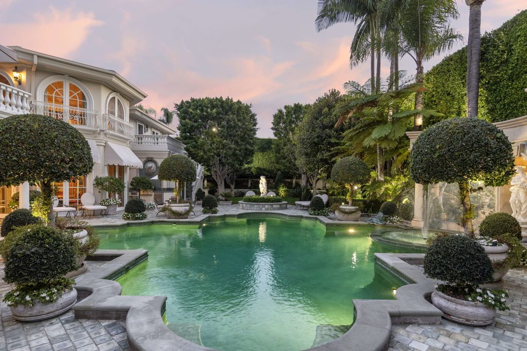 815 Cord Circle, Beverly Hills, California is a palatial residence sited on over a 1/2 acre with complete privacy, grounds are magical in every sense featuring a Roman style pool, fresco paintings and formal gardens.