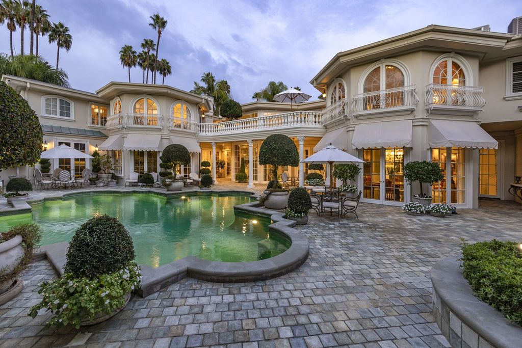 815 Cord Circle, Beverly Hills, California is a palatial residence sited on over a 1/2 acre with complete privacy, grounds are magical in every sense featuring a Roman style pool, fresco paintings and formal gardens.