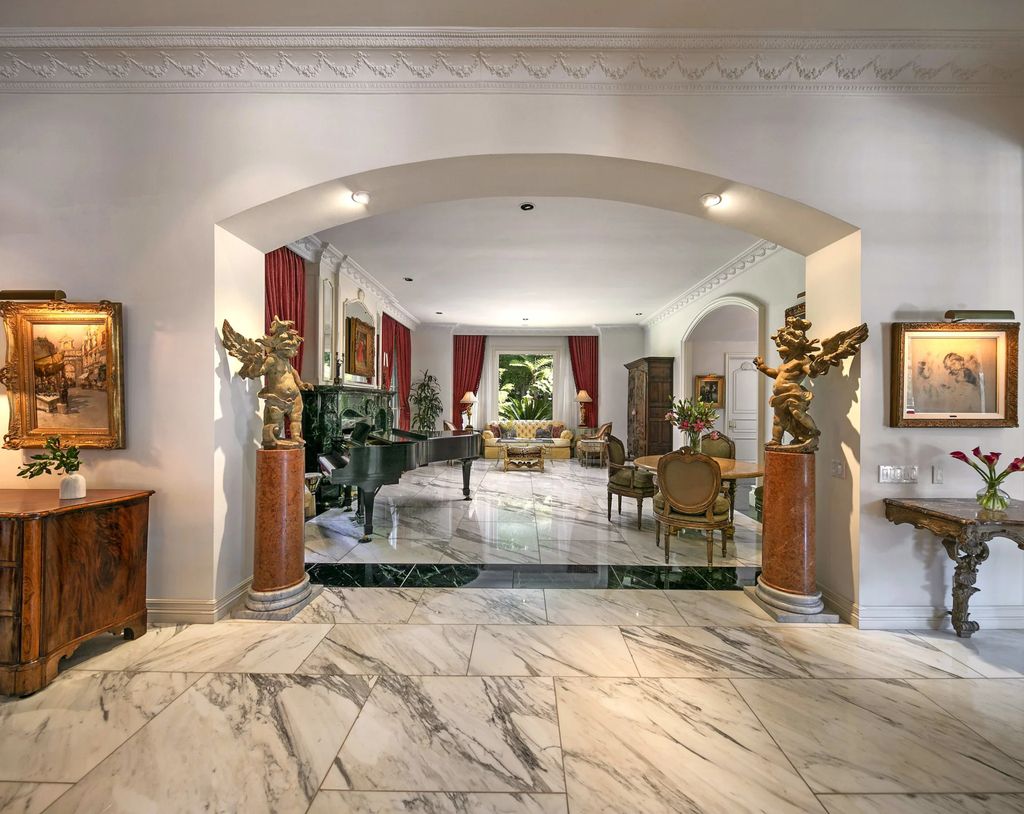 815 Cord Circle, Beverly Hills, California is a palatial residence sited on over a 1/2 acre with complete privacy, grounds are magical in every sense featuring a Roman style pool, fresco paintings and formal gardens.