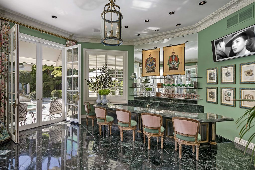 815 Cord Circle, Beverly Hills, California is a palatial residence sited on over a 1/2 acre with complete privacy, grounds are magical in every sense featuring a Roman style pool, fresco paintings and formal gardens.