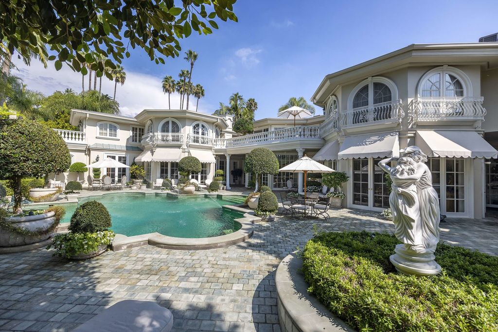815 Cord Circle, Beverly Hills, California is a palatial residence sited on over a 1/2 acre with complete privacy, grounds are magical in every sense featuring a Roman style pool, fresco paintings and formal gardens.