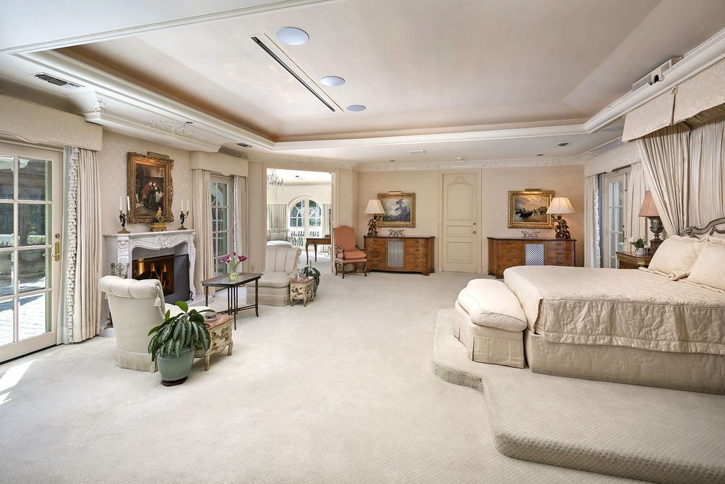 815 Cord Circle, Beverly Hills, California is a palatial residence sited on over a 1/2 acre with complete privacy, grounds are magical in every sense featuring a Roman style pool, fresco paintings and formal gardens.