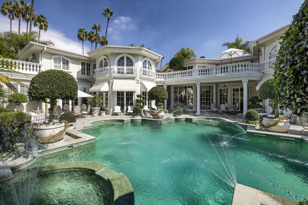 815 Cord Circle, Beverly Hills, California is a palatial residence sited on over a 1/2 acre with complete privacy, grounds are magical in every sense featuring a Roman style pool, fresco paintings and formal gardens.