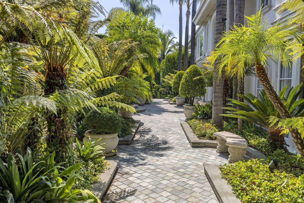 815 Cord Circle, Beverly Hills, California is a palatial residence sited on over a 1/2 acre with complete privacy, grounds are magical in every sense featuring a Roman style pool, fresco paintings and formal gardens.