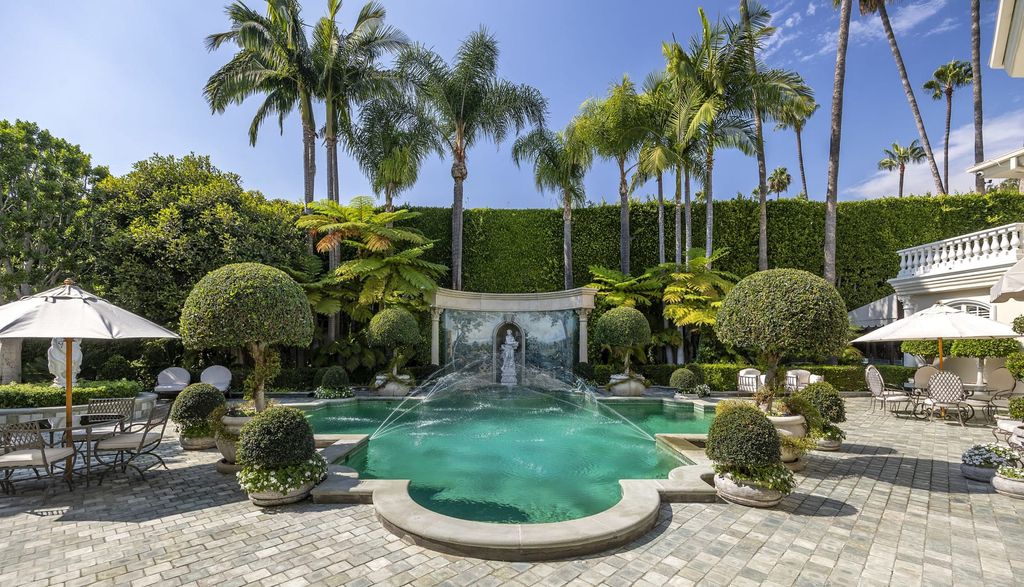 815 Cord Circle, Beverly Hills, California is a palatial residence sited on over a 1/2 acre with complete privacy, grounds are magical in every sense featuring a Roman style pool, fresco paintings and formal gardens.