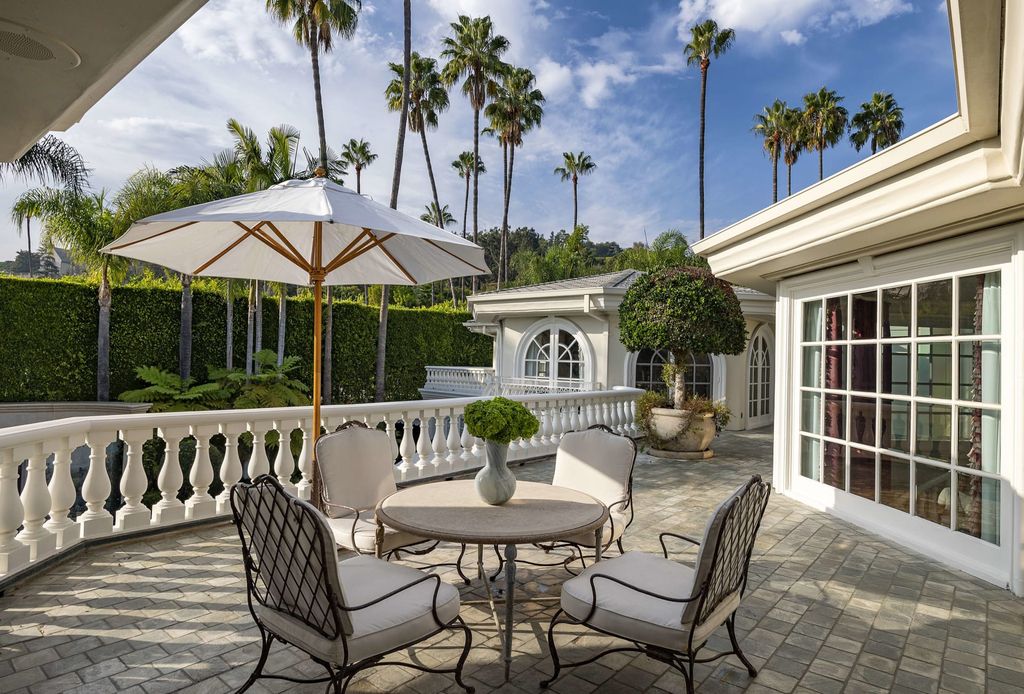 815 Cord Circle, Beverly Hills, California is a palatial residence sited on over a 1/2 acre with complete privacy, grounds are magical in every sense featuring a Roman style pool, fresco paintings and formal gardens.