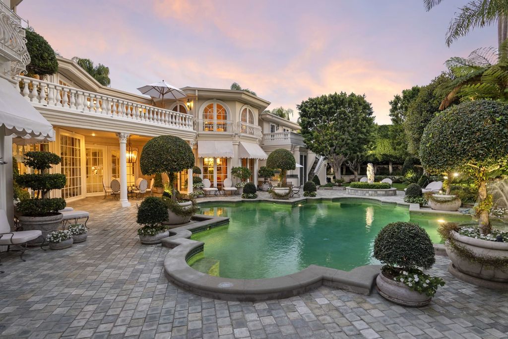 815 Cord Circle, Beverly Hills, California is a palatial residence sited on over a 1/2 acre with complete privacy, grounds are magical in every sense featuring a Roman style pool, fresco paintings and formal gardens.