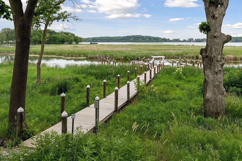 The Home in Excelsior is built by the most awarded architectural designer and builder in the state - Charles Cudd Co, now available for sale. This home located at 3776 Woodland Cove Pkwy, Excelsior, Minnesota