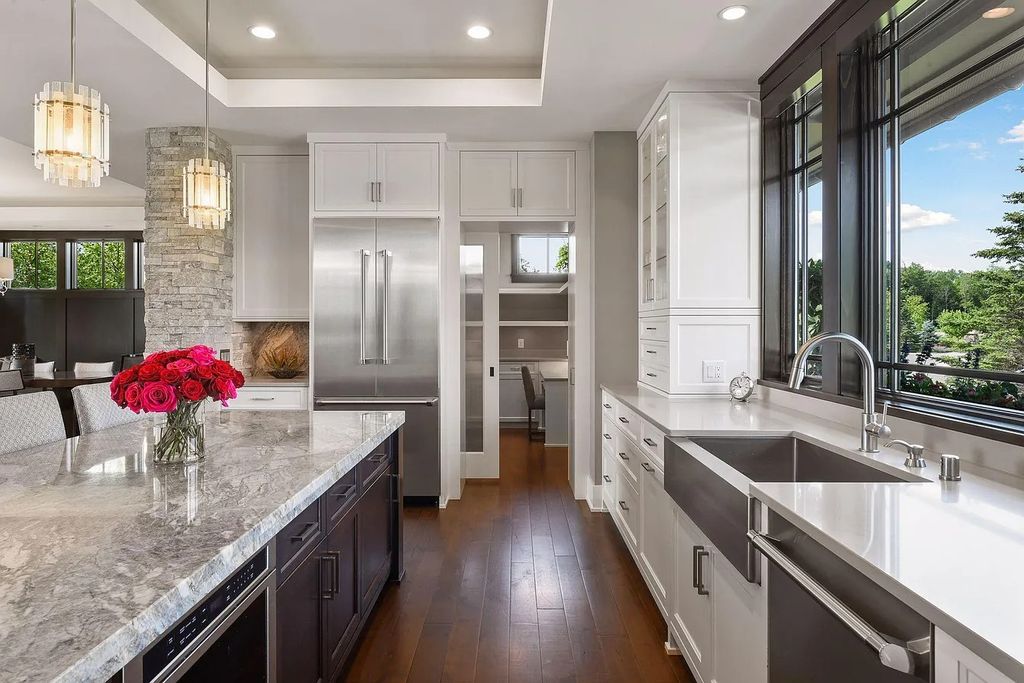 The Home in Excelsior is built by the most awarded architectural designer and builder in the state - Charles Cudd Co, now available for sale. This home located at 3776 Woodland Cove Pkwy, Excelsior, Minnesota
