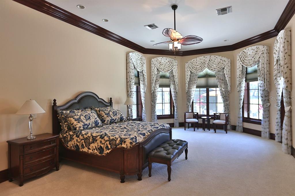 3956 NW 85th Terrace, Ocala, Florida is a spectacular residence perfect for family living and entertaining with open floor plan, resort style screen enclosed pool, summer kitchen, beautiful sunsets overlooking the golf course.
