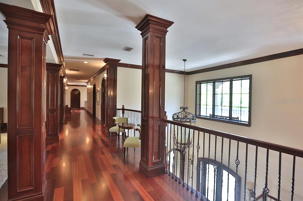 3956 NW 85th Terrace, Ocala, Florida is a spectacular residence perfect for family living and entertaining with open floor plan, resort style screen enclosed pool, summer kitchen, beautiful sunsets overlooking the golf course.