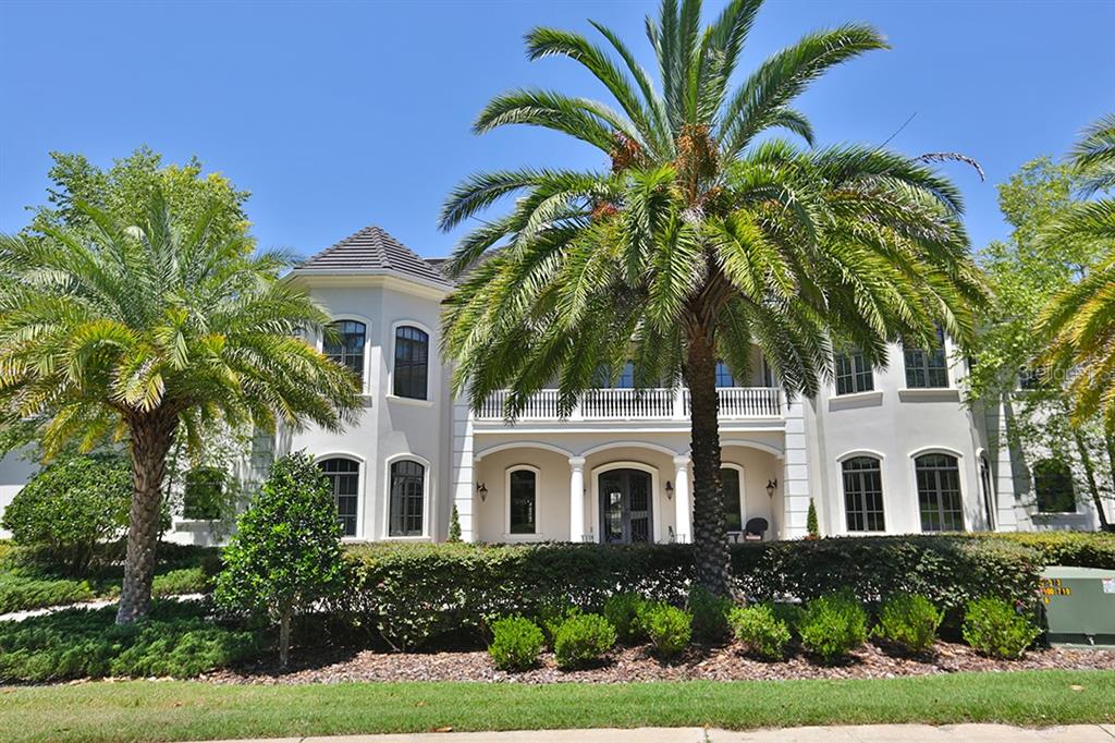 3956 NW 85th Terrace, Ocala, Florida is a spectacular residence perfect for family living and entertaining with open floor plan, resort style screen enclosed pool, summer kitchen, beautiful sunsets overlooking the golf course.