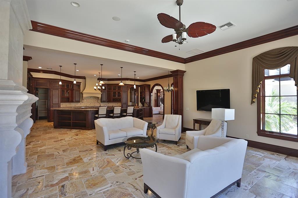 3956 NW 85th Terrace, Ocala, Florida is a spectacular residence perfect for family living and entertaining with open floor plan, resort style screen enclosed pool, summer kitchen, beautiful sunsets overlooking the golf course.
