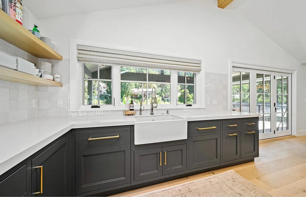 The Estate in Lake Oswego is a luxurious home ideally located on a rare waterfront cul-de-sac with backyard now available for sale. This home located at 17435 Wren Ct, Lake Oswego, Oregon; offering 04 bedrooms and 05 bathrooms with 10,454 square feet of land.