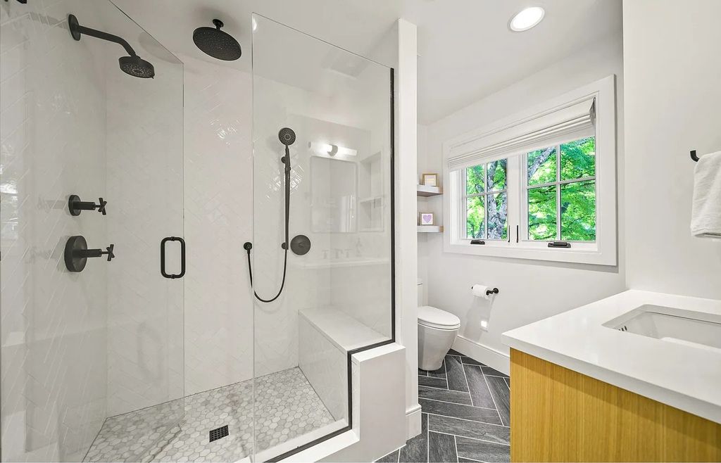 The Estate in Lake Oswego is a luxurious home ideally located on a rare waterfront cul-de-sac with backyard now available for sale. This home located at 17435 Wren Ct, Lake Oswego, Oregon; offering 04 bedrooms and 05 bathrooms with 10,454 square feet of land.