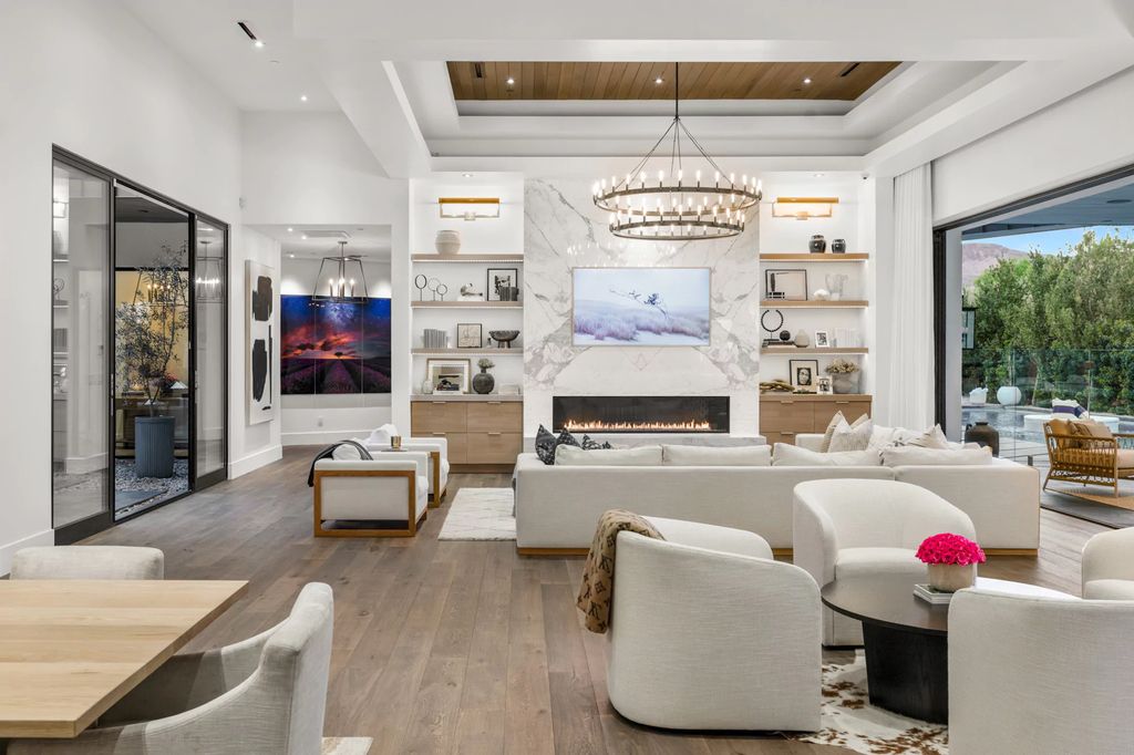 The Las Vegas Estate, a magnificent property has been completely redesigned with the finest quality finishes sitting on a half acre behind the guarded gates of Indigo in The Ridges is now available for sale. This home located at 42 Crested Cloud Way, Las Vegas, Nevada